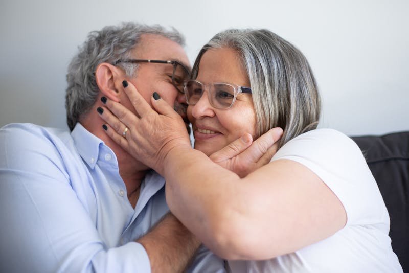 Mature couple sharing a loving moment representing senior dating companionship